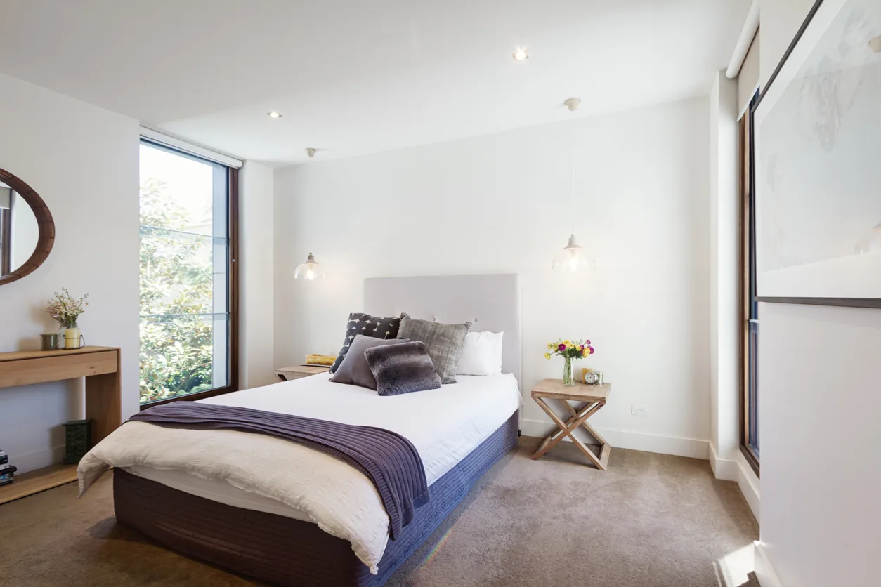 Modern bedroom suite with pendant lights